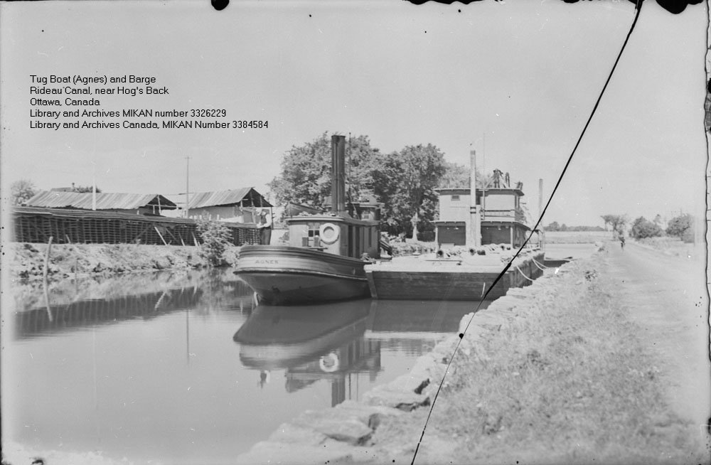 Rideau Canal Tug Boat and Barge near Hog's Back, Ottawa, Ontario, Canada